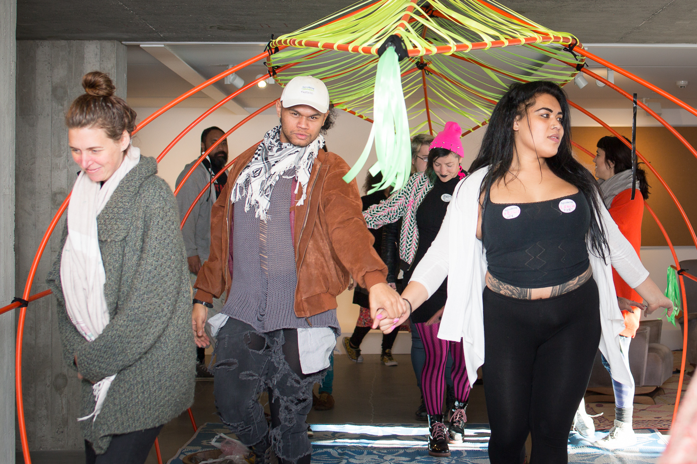 Artists during the fono/noho/gathering before MAKING SPACE opened, dancing through the fale. Numangatini Mackenzie, Aré Vaka Falé Va'a Wharé Waka Halé Va'a, 2017. Photo: Janneth Gil