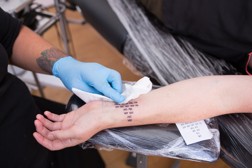 Vaimaila Urale, 'TYPEFACE - Live Tattoo Session & Public Mural' - Tattoo session Photo credit Janneth Gil