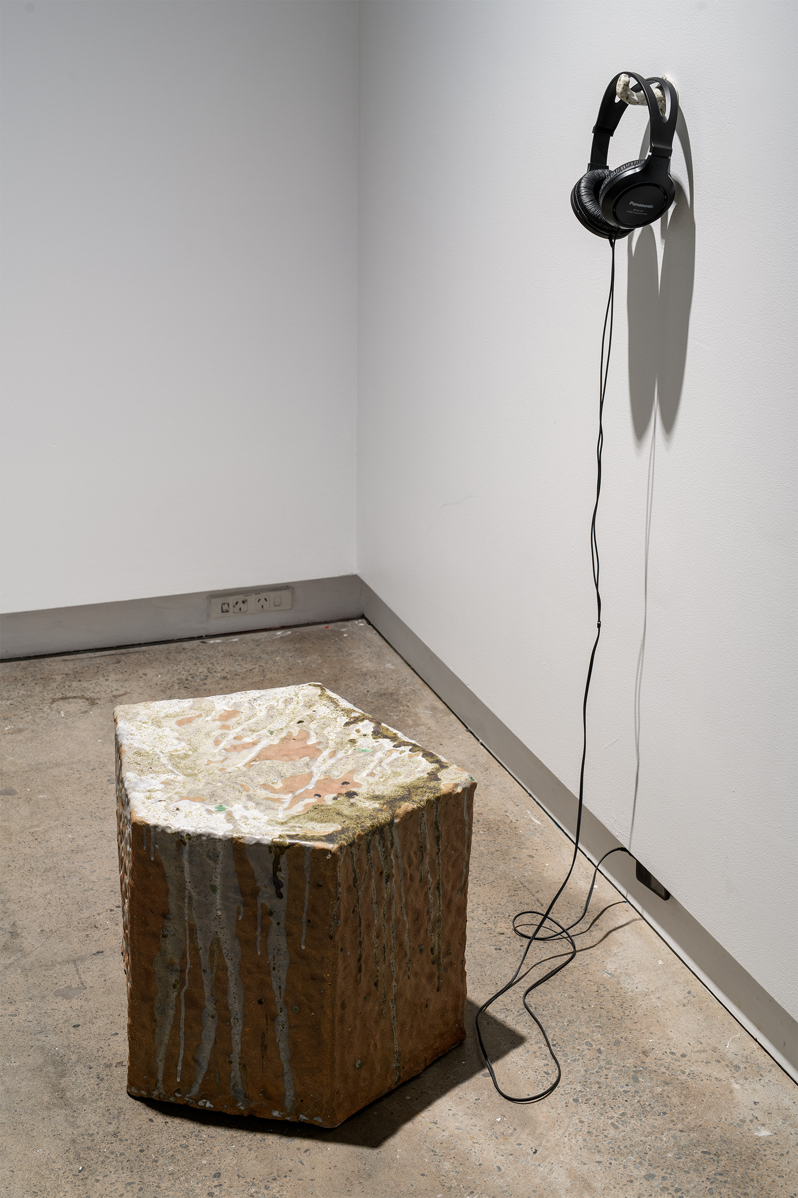 'E noho', Reclaimed clay, found ceramic and glass from Whaka Oho Rahi; Karitāne sand, Basalt from Blackhead Quarry, 450 x 435 x 370 mm, 2026