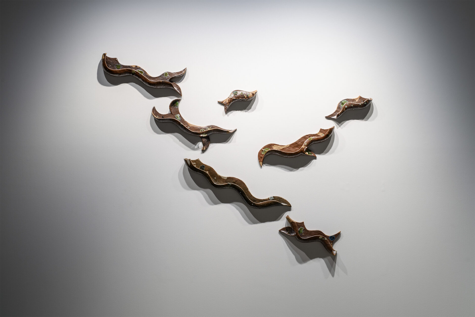 'We used to be a braided awa', Reclaimed clay, found ceramic and glass from Whaka Oho Rahi; Karitāne sand, Grey river silt, Matatā pumice, Maukatere gold, 2700 x 1120 mm, 2026