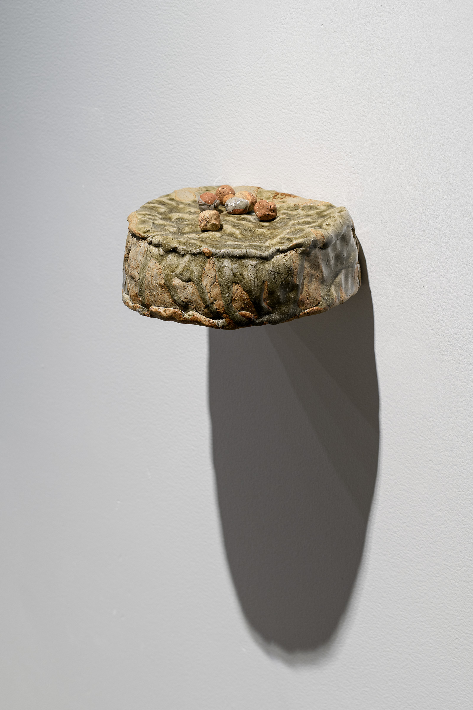 'We used to be a braided awa' - detail, Reclaimed clay, found ceramic and glass from Whaka Oho Rahi; Karitāne sand, Grey river silt, Matatā pumice, Maukatere gold, 2700 x 1120 mm, 2026